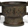 An archaic bronze ritual food vessel and cover, Gui, Western Zhou dynasty (1050-771 BC)