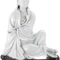 A Dehua 'Blanc-de-chine' seated figure of Guanyin, Qing dynasty, 18th century