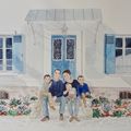 Aquarelle d'une famille devant leur maison