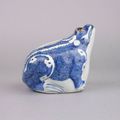 A Chinese porcelain blue and white frog form vessel. Wanli, 1573-1619