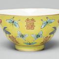 A yellow-ground famille-rose 'butterfly' cup, Tongzhi mark and period