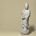 A Dehua figure of a standing figure of Guanyin, 18th century
