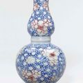 An underglaze blue and copper-red double-gourd vase, 18th Century