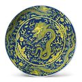 An underglaze-blue and yellow-enameled 'Dragon' dish, Qianlong seal mark and period (1736-1795)