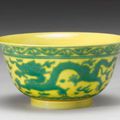 A green and yellow-ground 'dragon' bowl. Qianlong Seal Mark And Period. 
