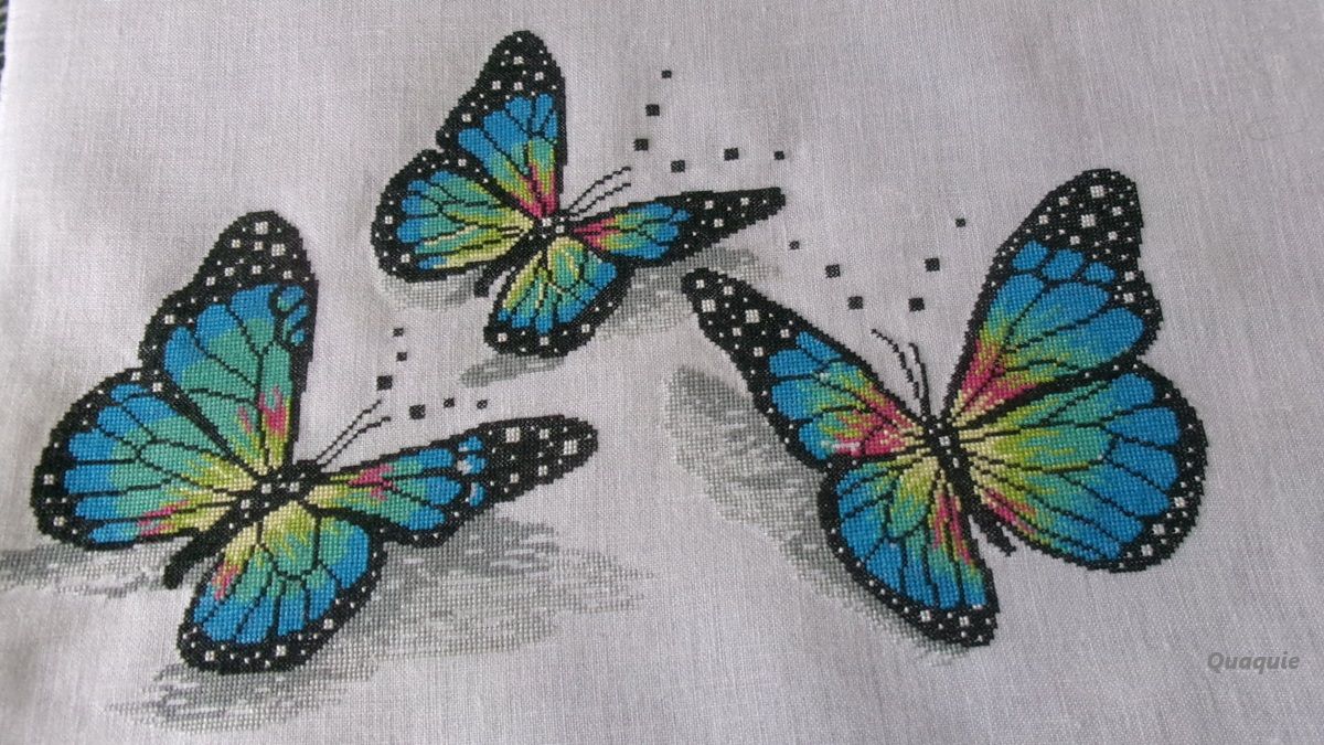 trois papillons