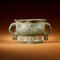 An archaic bronze ritual food vessel, gui, and a bronze wine vessel, jue. Western Zhou Period