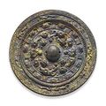 A gilt-bronze circular mirror with deities and beasts. Eastern Han dynasty- Three Kingdoms period, 2nd-3rd century