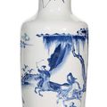 A blue and white porcelain rouleau vase with a scene of Yang Guang and female riders in the Western Palace, Kangxi period