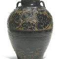 A large 'Cizhou' carved black-glazed jar, Yuan-Ming dynasty