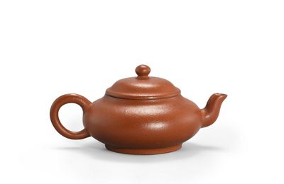 A Yixing red stoneware teapot, Changji and Yifang mark, Qing dynasty, 19th century