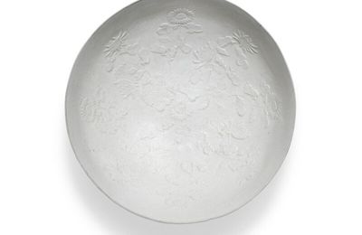 A moulded Ding-type bowl, Ming dynasty (1368-1644)