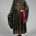 A fine and rare Mariano Fortuny stencilled orientalist black silk evening coat, circa 1910-20
