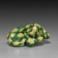 Antique Chinese green and yellow glazed porcelain lion