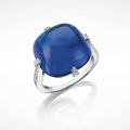 An important 23.14 carats square cushion-shaped cabochon Kashmir sapphire and diamond ring
