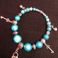 Bracelet perles magiques bleues turquoises & argenté