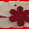 COLLIER A FLEUR ROUGE