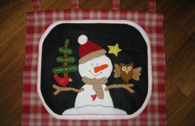 Bonhomme de neige aux oiseaux