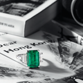 A Fine Emerald and Diamond Ring