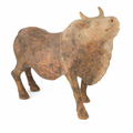 A rare large painted pottery model of an ox, Tang Dynasty (618-907)