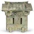 A green glazed pottery model of a building, Han dynasty (206 BC-AD 220)