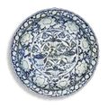 A rare large blue and white moulded 'mandarin duck and lotus pond' dish, Yuan dynasty (1279-1368)