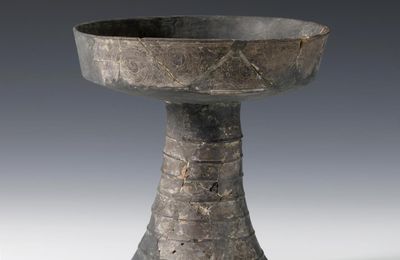 Dou (stem plate) with Bird and Chi-dragon, Liangzhu Culture (5400-4300 BCE)