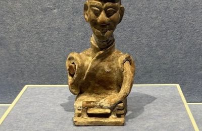 Red pottery of a cook, Han dynasty (206 BC-220 AD)