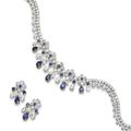 A sapphire and diamond flower necklace and earring suite, by Graff