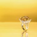Fancy deep brownish yellow diamond and diamond ring