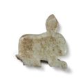 A small pale green jade hare-form pendant, Early Western Zhou dynasty