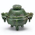 A spinach-green jade tripod incense burner and cover, Qing dynasty, Qianlong period (1736-1795)