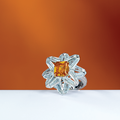 A rare 2.84 carats rectangular-cut fancy deep yellow-orange diamond and diamond ring