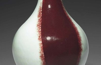 An unusual copper-red-streaked olive-shaped vase, ganlanping, 18th century