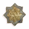 A lustre and cobalt-blue pottery star tile, Kashan, Central Iran, 13th century