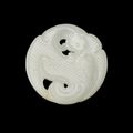 A white jade 'phoenix' circular plaque, Qing dynasty, 18th century