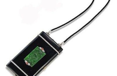 A coral, lacquer, jade and diamond vanity case, by Charlton & Co, circa 1925