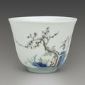 A famille verte 'Prunus' 'Month' cup, Kangxi six-character mark in underglaze-blue within a double circle and of the period 