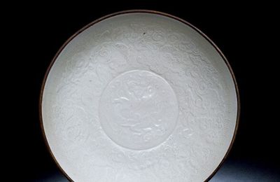 A Molded Ding Lion and Grapevine Dish, Northern Song Dynasty, 10th-12th Century