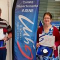 LA PLAQUETTE DE LA FÉDÉRATION FRANÇAISE DE GYMNASTIQUE POUR JEAN-PIERRE ET CHRISTIANE BACHELART.