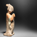 A pottery figure of a court lady, Tang Dynasty (618-907)
