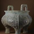 An important and massive inscribed archaic bronze food vessel, li, Middle Western Zhou dynasty, late 10th or 9th century BC