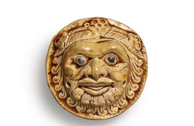 A yellow-glazed 'foreigner' whistle, Northern Qi dynasty