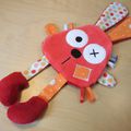 Doudou plat lapin orange rouge