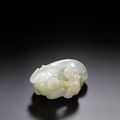 A white jade 'Buffalo and standing boy' carving, 17th century 