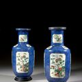 A pair of powder blue ground and famille vert porcelain rouleau vases, Qing dynasty, 19th century