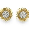 A pair of retro diamond and gold earrings, by Cartier