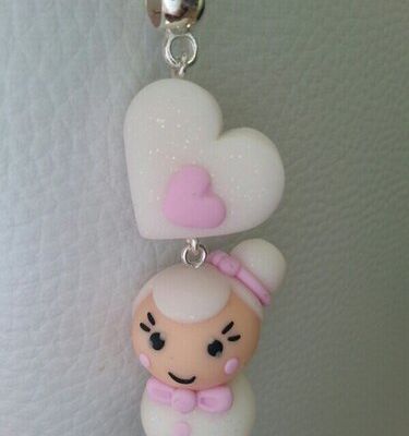 La petite poupée coeur rose et blanc