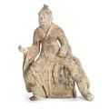 A painted pottery figure of a musician, Tang Dynasty