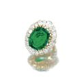 Octagonal step-cut emerald and diamond ring